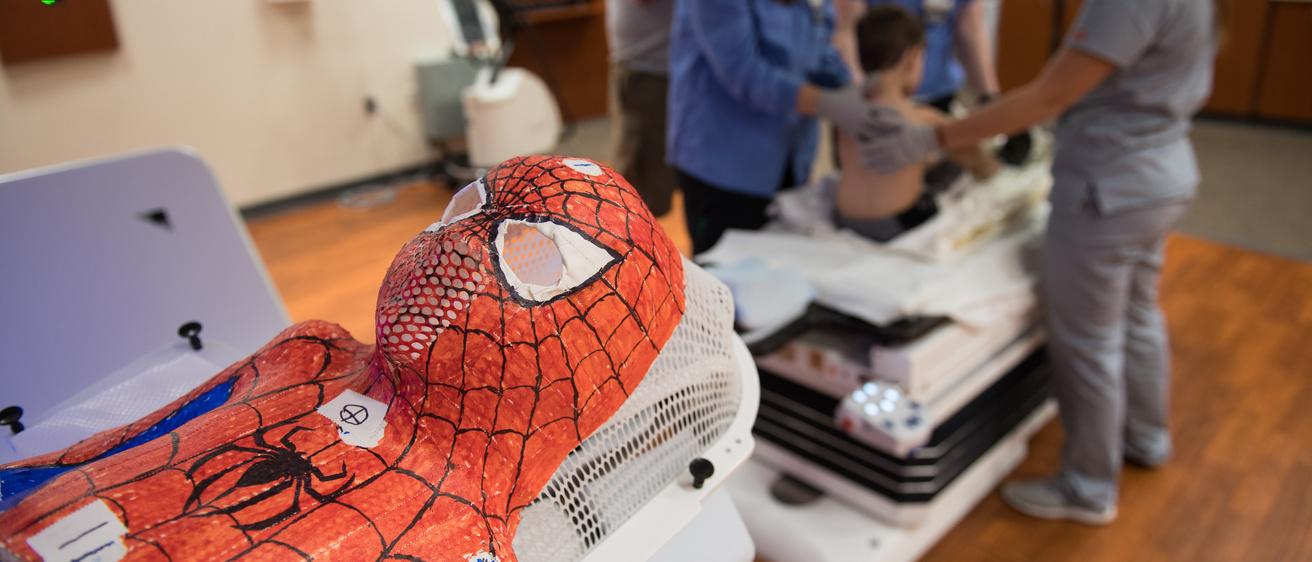 Image of Spiderman radiation mask with VERSA linac